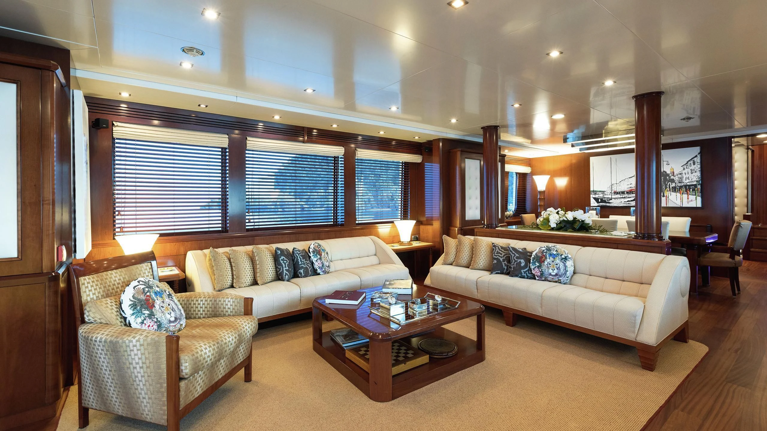 a living room with a couch and a coffee table aboard W EXPLORER Yacht for Sale