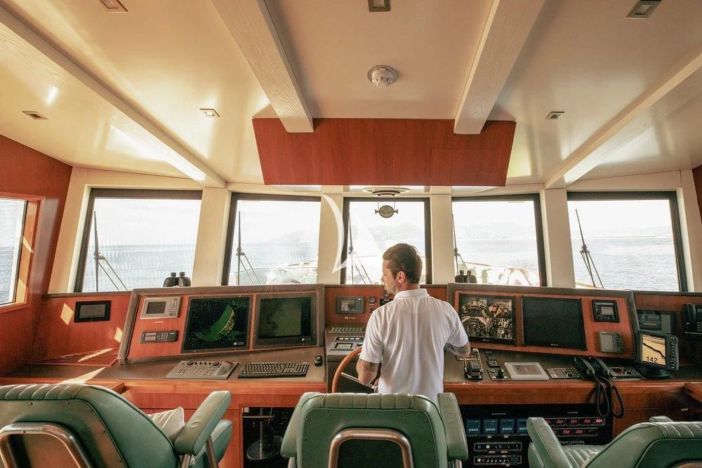 a person sitting in a bus aboard W EXPLORER Yacht for Sale