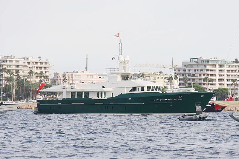 a large green boat in the water aboard W EXPLORER Yacht for Sale