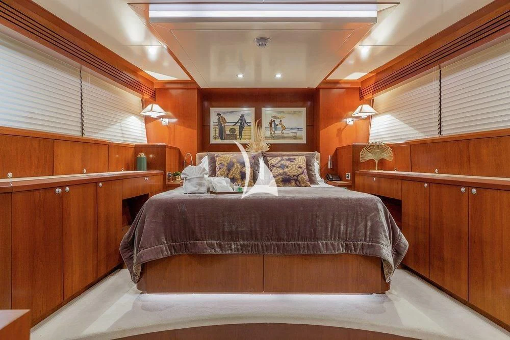 a bed in a room aboard W EXPLORER Yacht for Sale