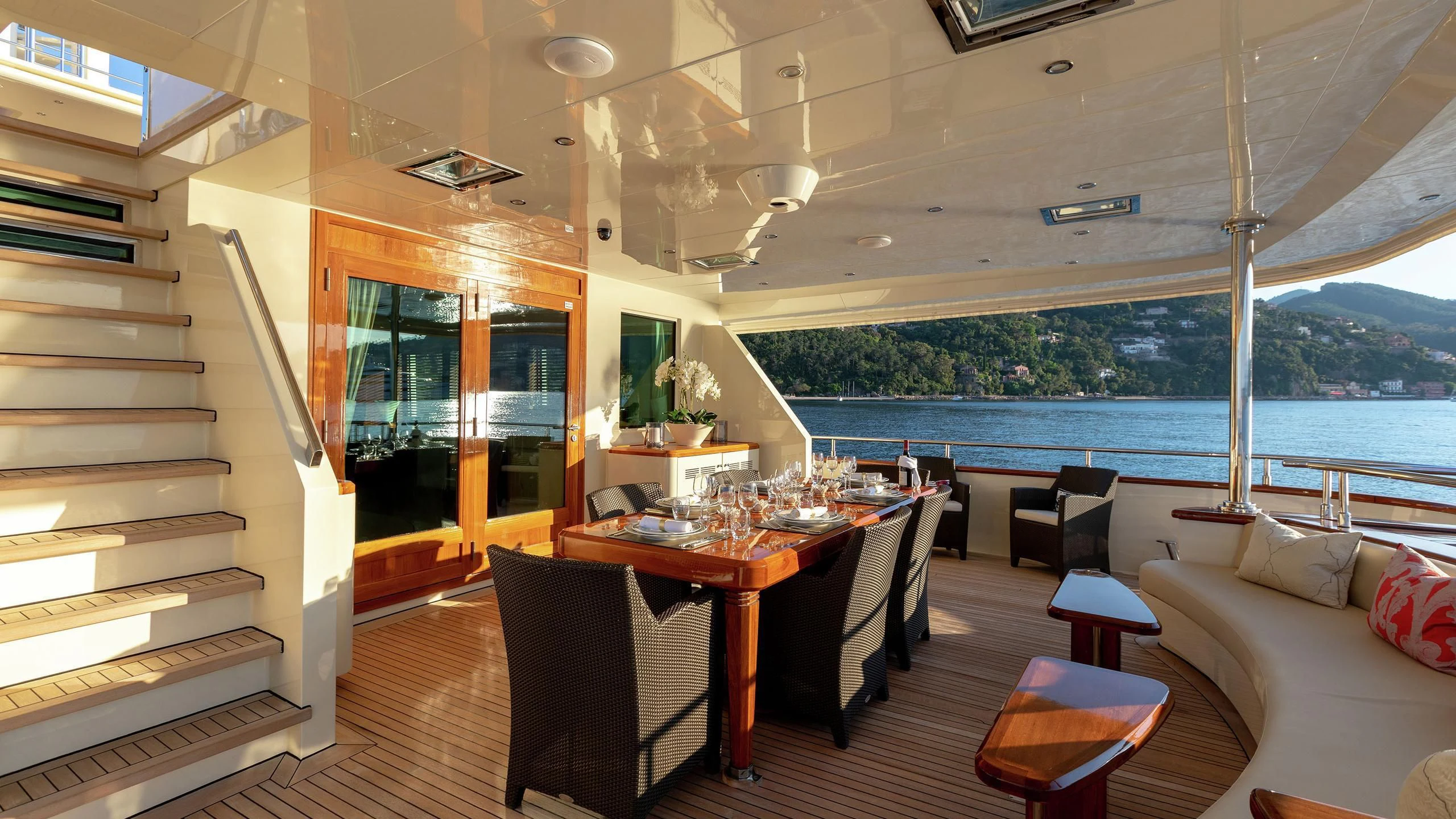 a room with a table and chairs aboard W EXPLORER Yacht for Sale