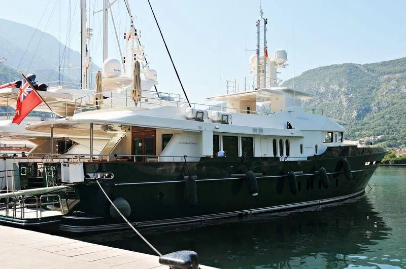 a boat docked at a pier aboard W EXPLORER Yacht for Sale