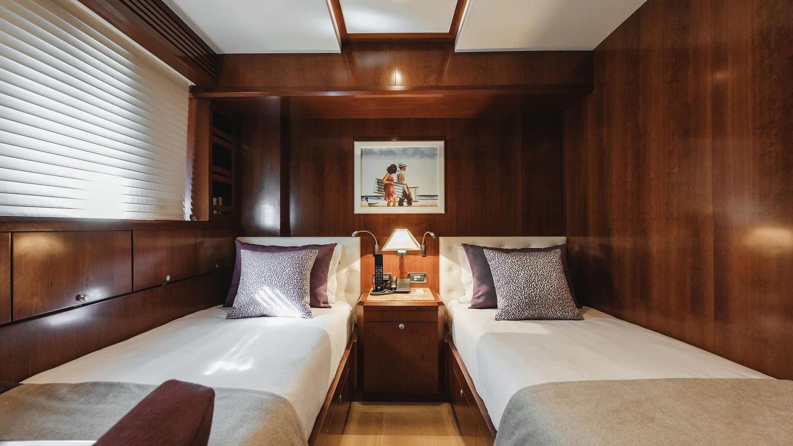a couple of beds in a room aboard W EXPLORER Yacht for Sale