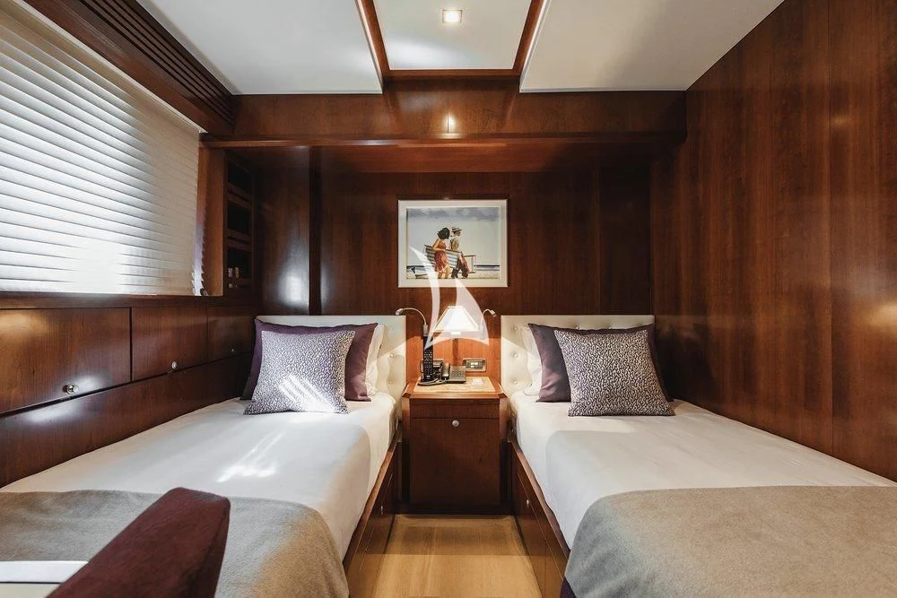 a room with two beds aboard W EXPLORER Yacht for Sale