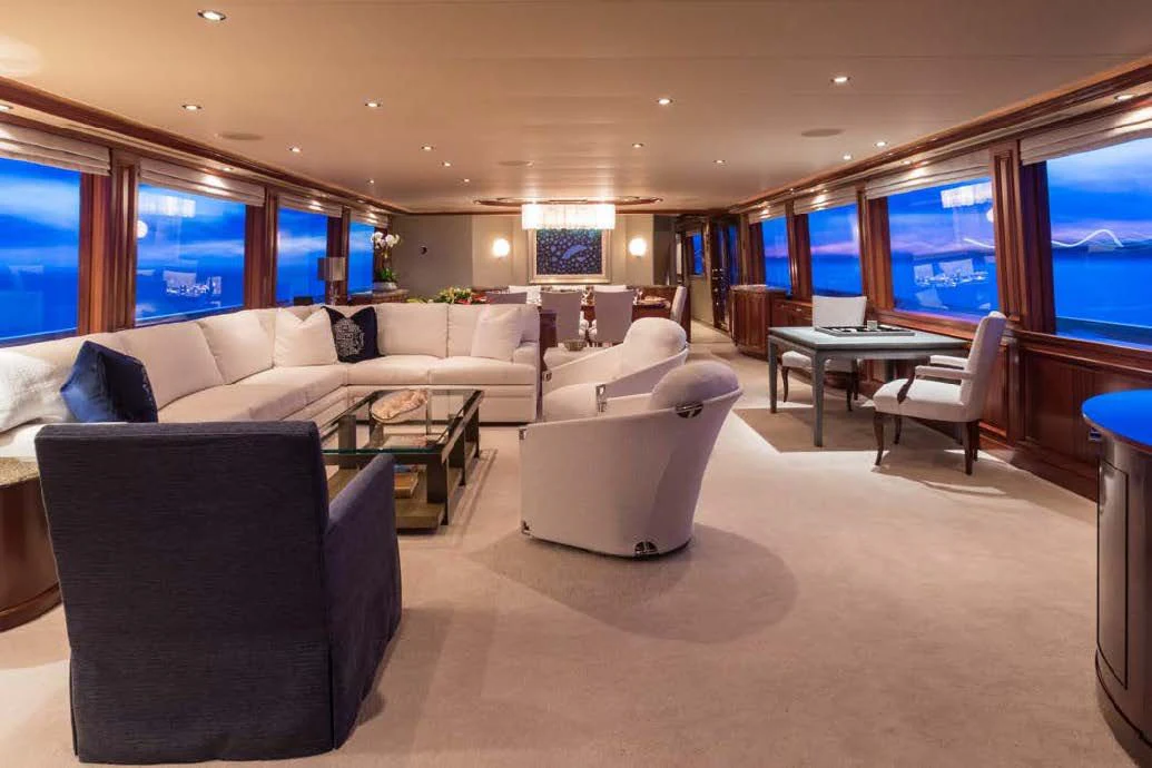 a living room with a large window aboard TRUST FUN Yacht for Sale