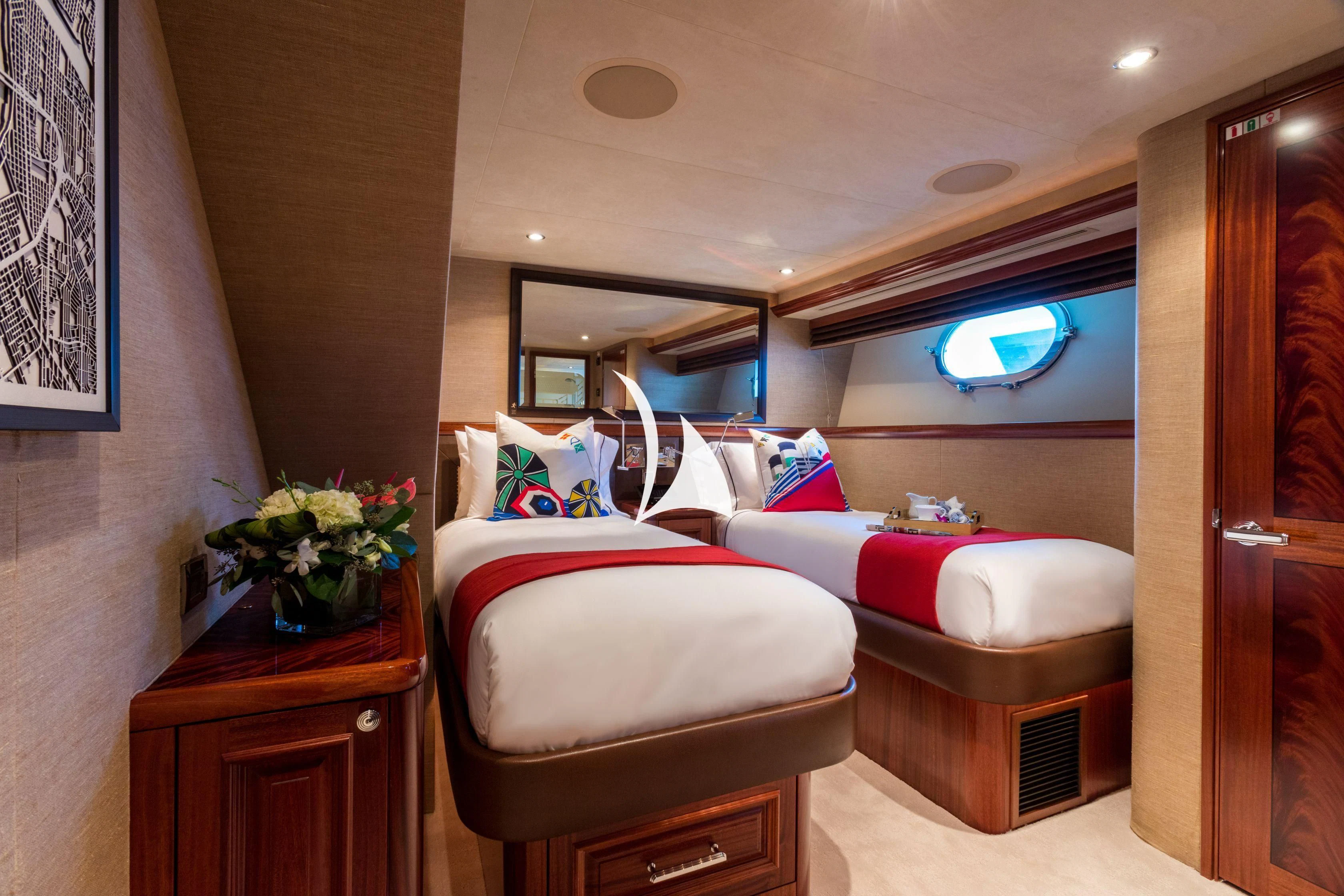 a room with a bed and a mirror aboard TRUST FUN Yacht for Sale