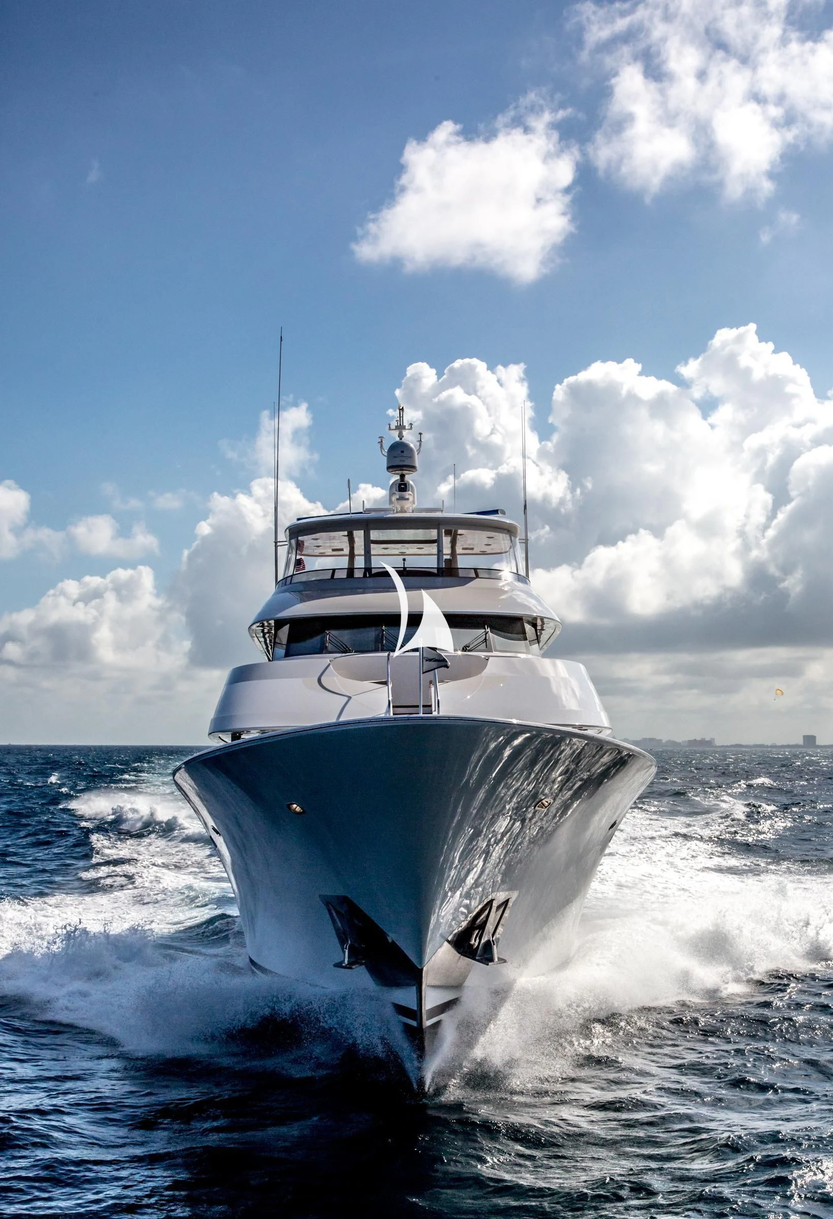 a white boat in the water aboard TRUST FUN Yacht for Sale