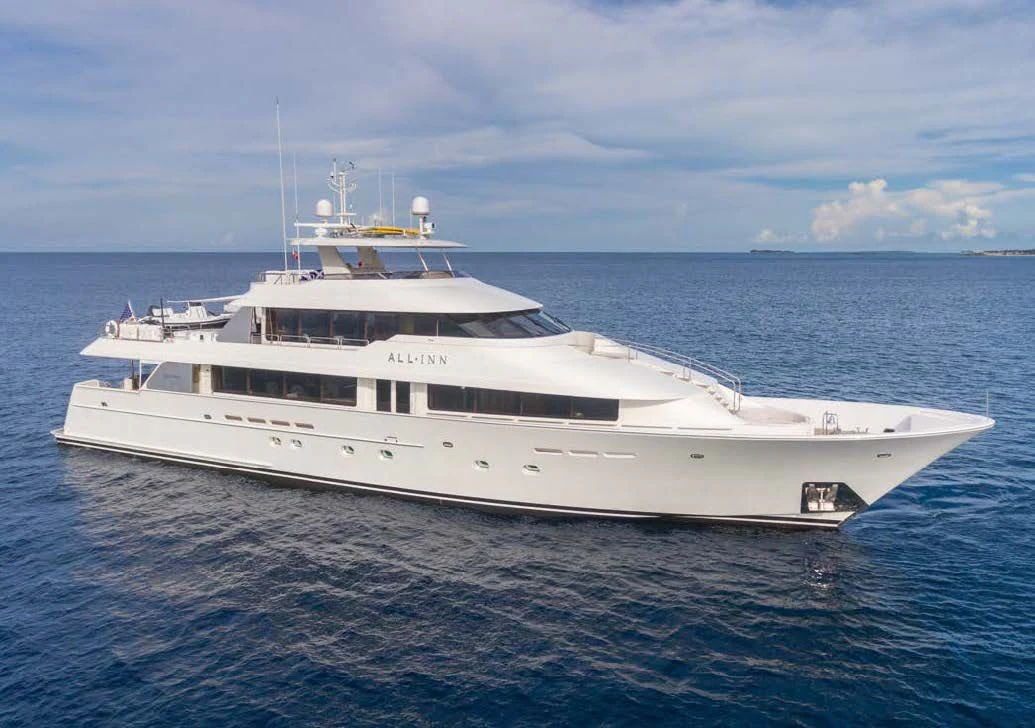 a white yacht in the water aboard TRUST FUN Yacht for Sale