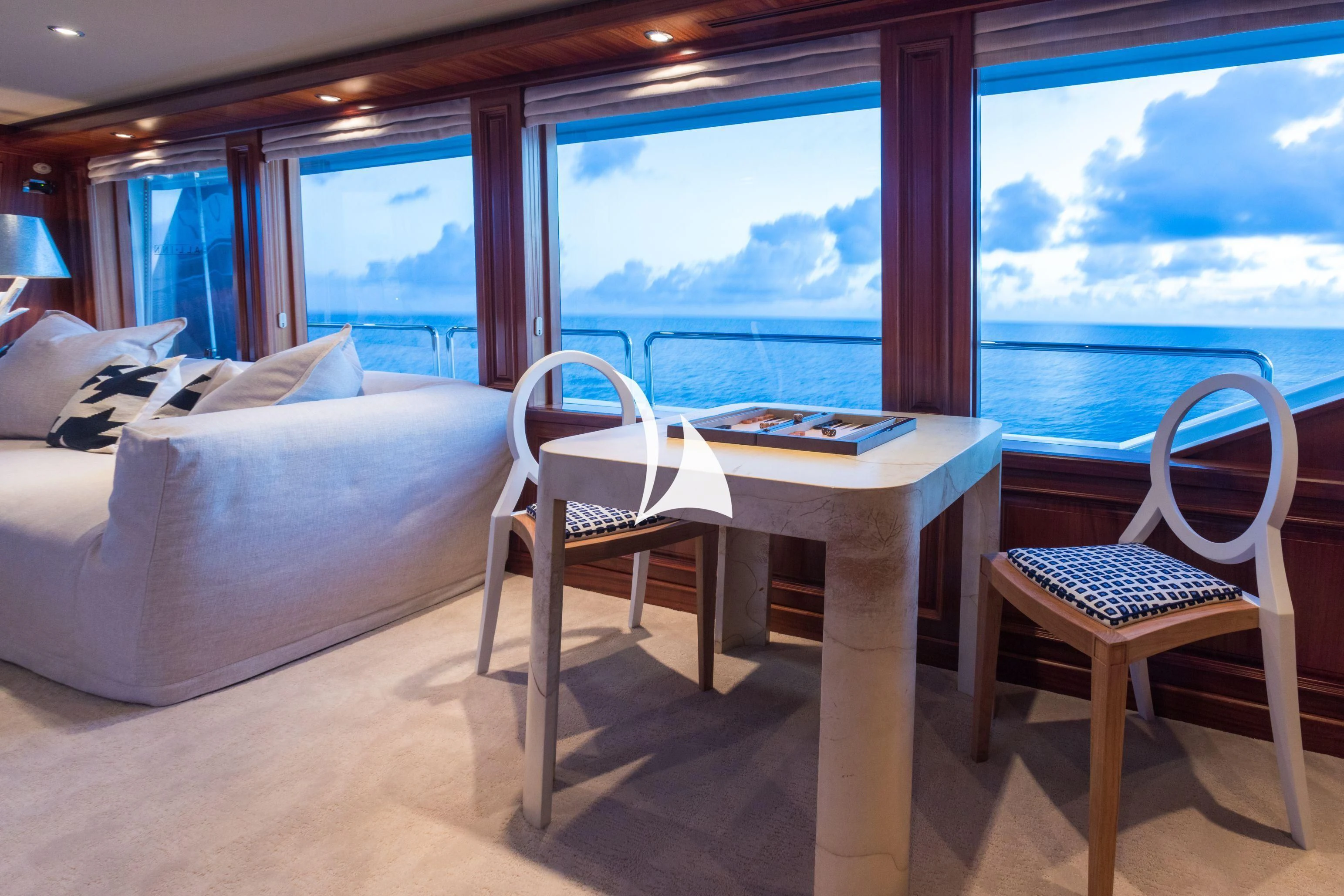 a table and chairs on a boat aboard TRUST FUN Yacht for Sale