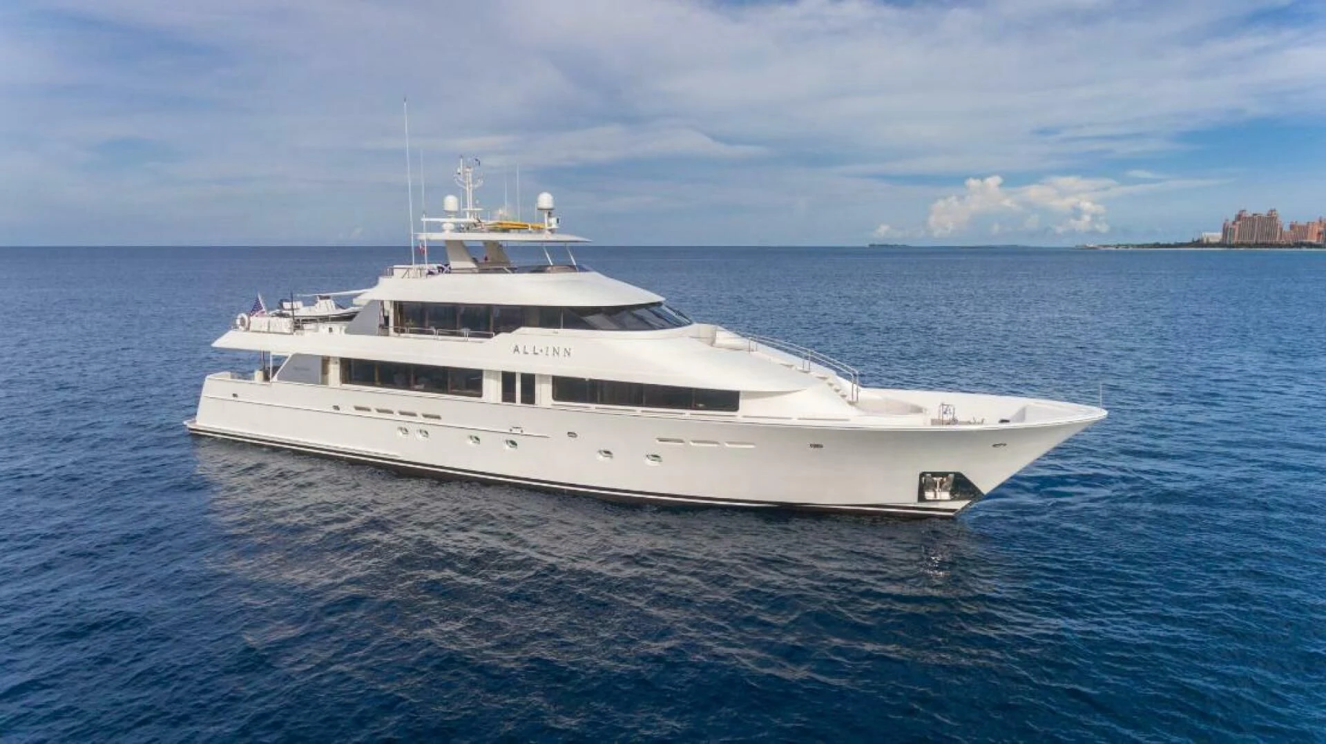 a white yacht in the water aboard TRUST FUN Yacht for Sale