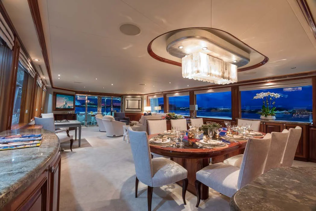 a large dining room with a large window aboard TRUST FUN Yacht for Sale