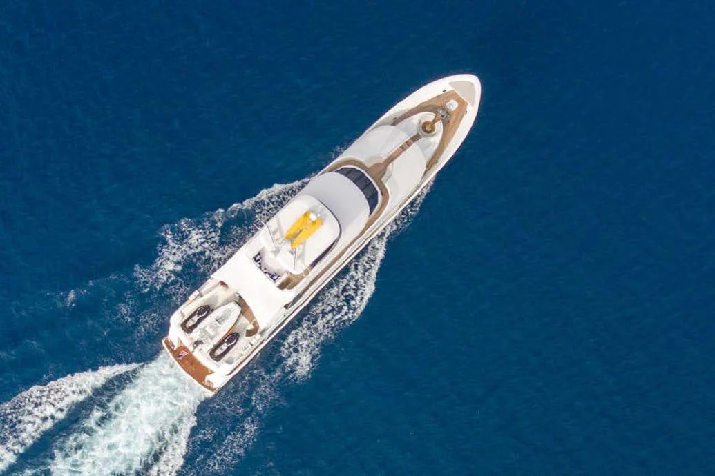 a space shuttle flying over the ocean aboard TRUST FUN Yacht for Sale