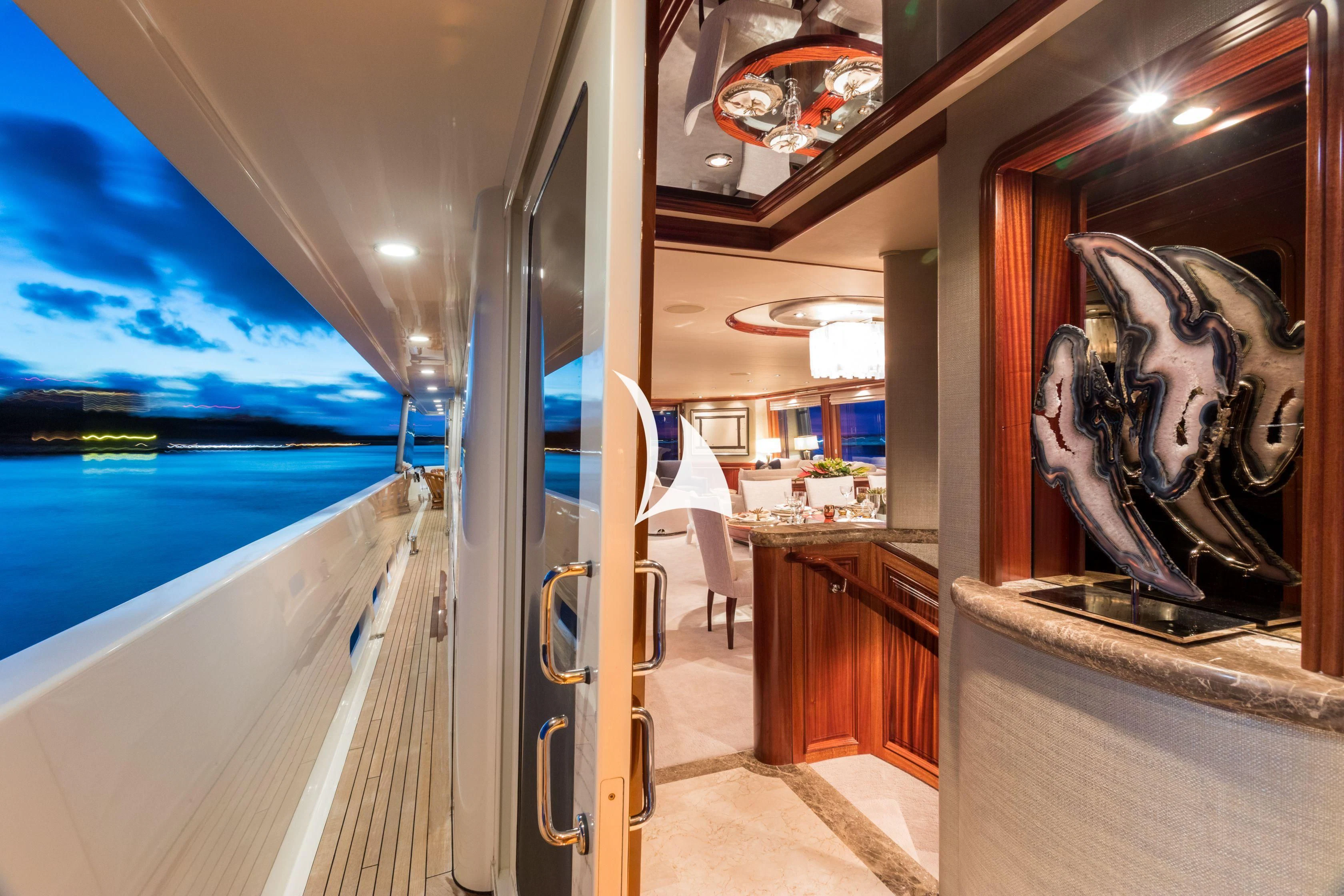 a hallway with a painting on the wall aboard TRUST FUN Yacht for Sale