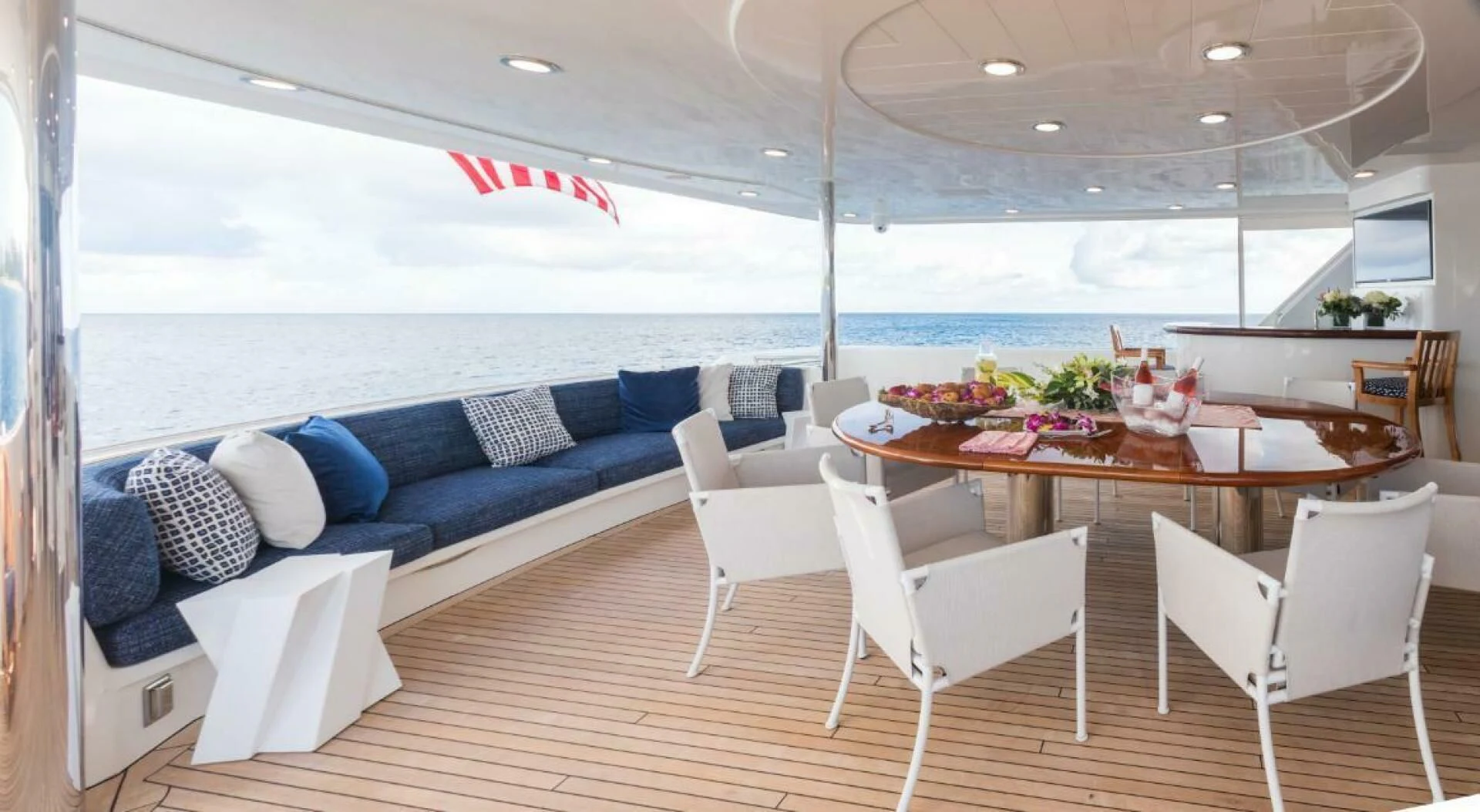 a room with a couch and a table and chairs aboard TRUST FUN Yacht for Sale