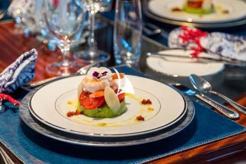 a plate of food aboard TRUST FUN Yacht for Sale