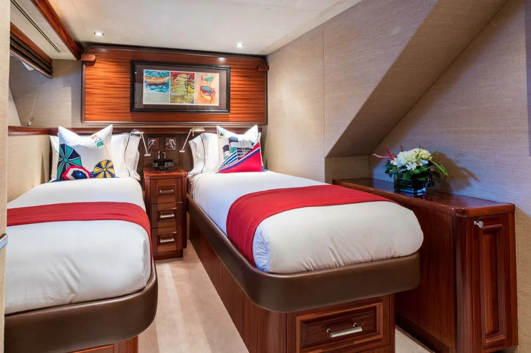 a room with two beds aboard TRUST FUN Yacht for Sale