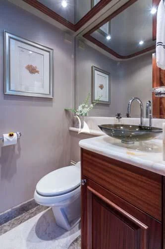 a bathroom with a sink and toilet aboard TRUST FUN Yacht for Sale