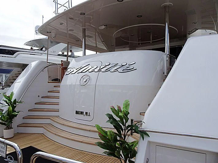 a white boat with a white sign aboard TRUST FUN Yacht for Sale
