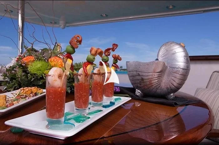 a table with food on it aboard TRUST FUN Yacht for Sale