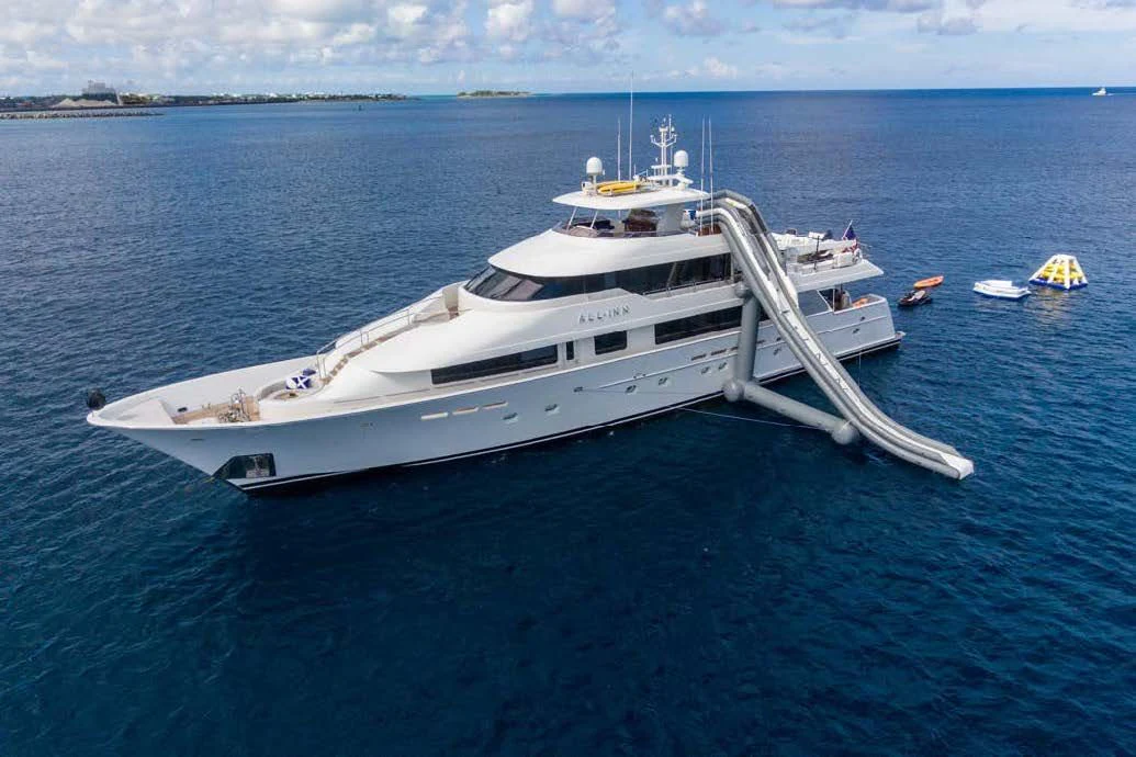 a white yacht in the water aboard TRUST FUN Yacht for Sale