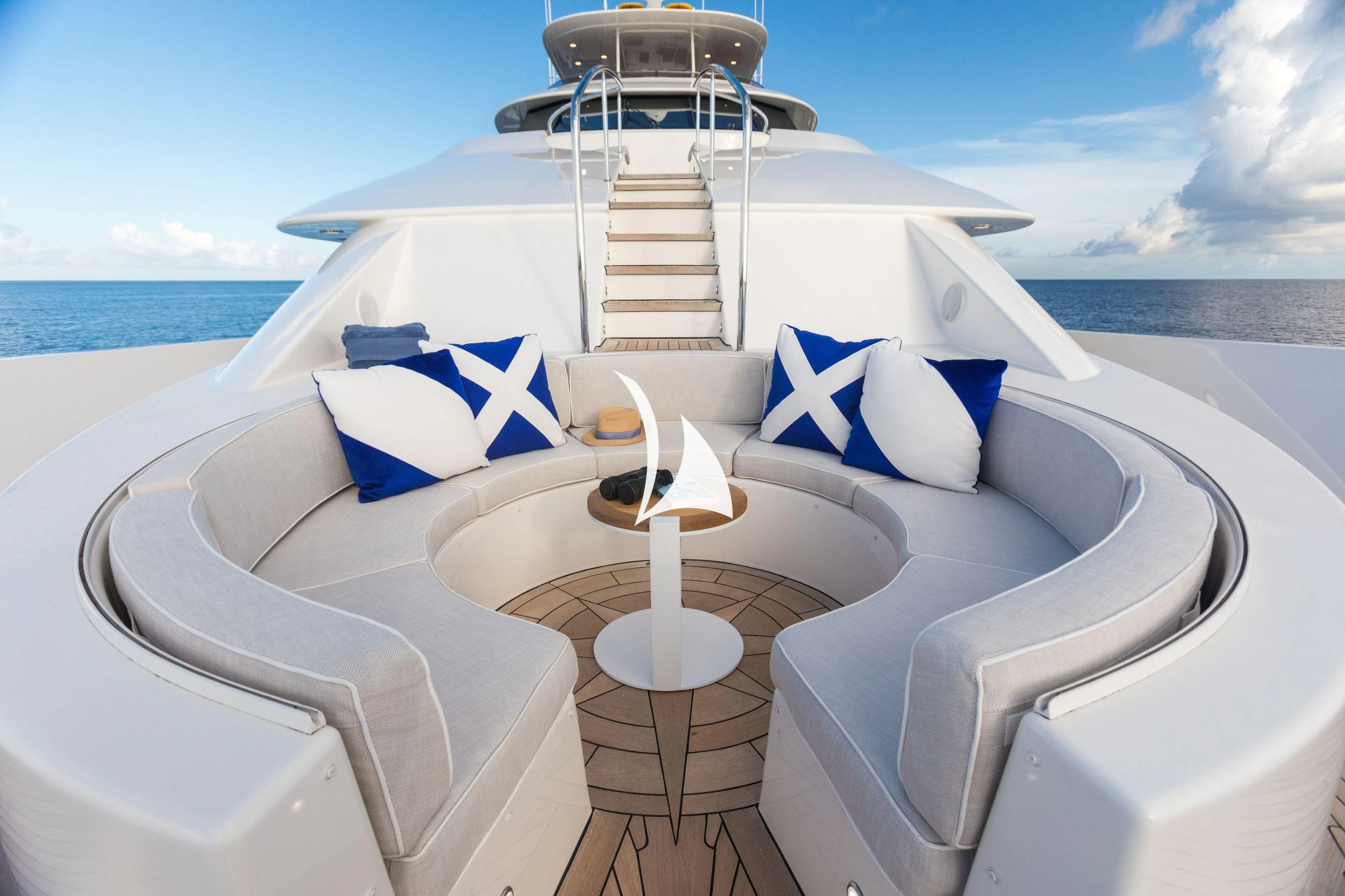 a boat with a flag on the front aboard TRUST FUN Yacht for Sale