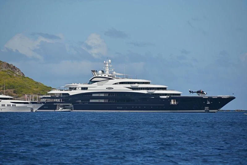 a large ship in the water aboard SERENE Yacht for Sale