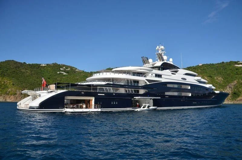 a large white boat on the water aboard SERENE Yacht for Sale