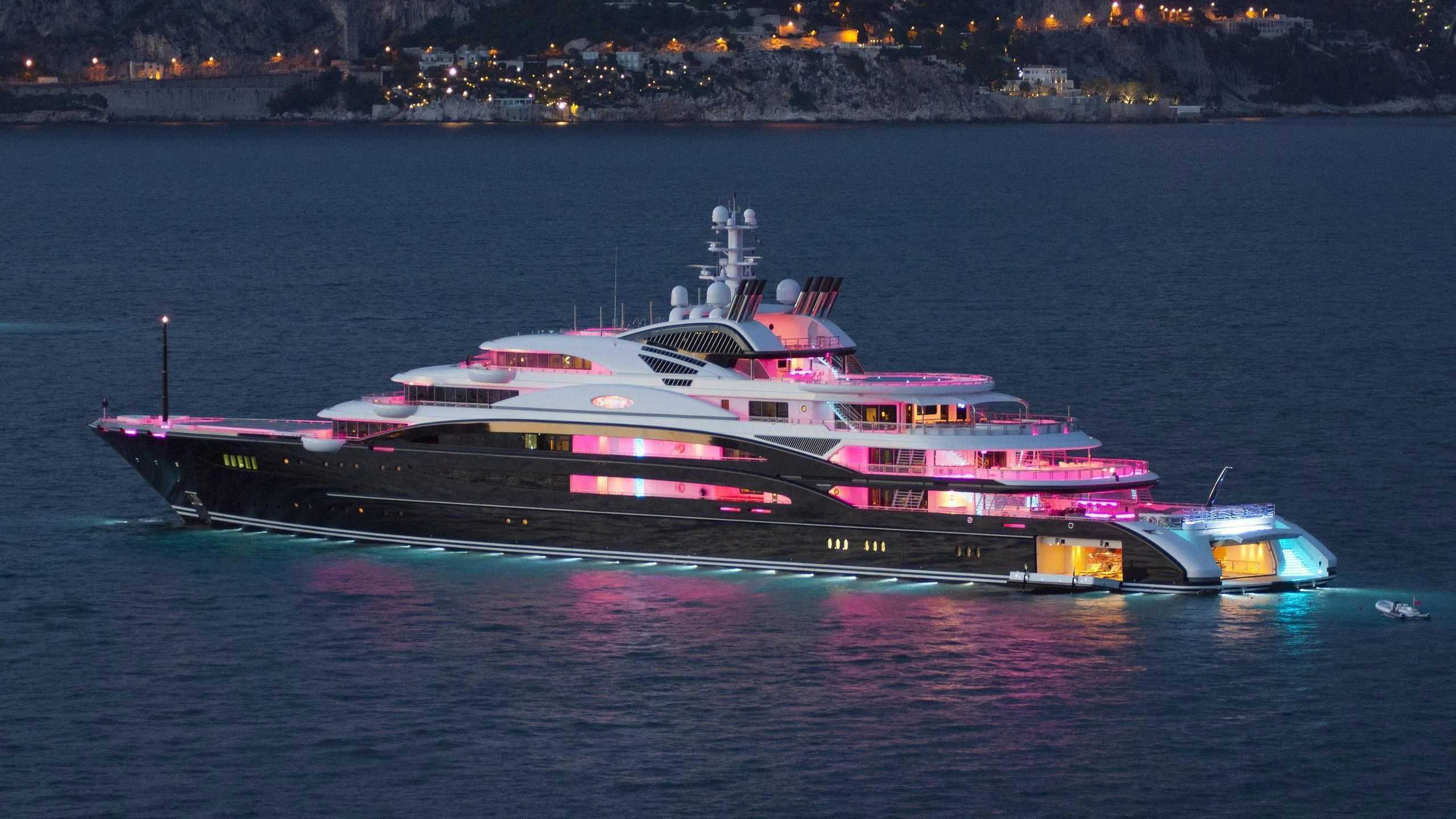 a large ship on the water aboard SERENE Yacht for Sale