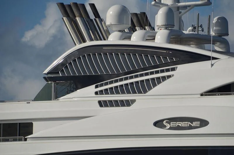 a white boat with a white roof aboard SERENE Yacht for Sale