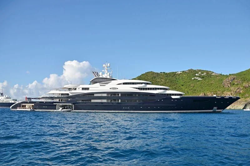 a large ship in the water aboard SERENE Yacht for Sale
