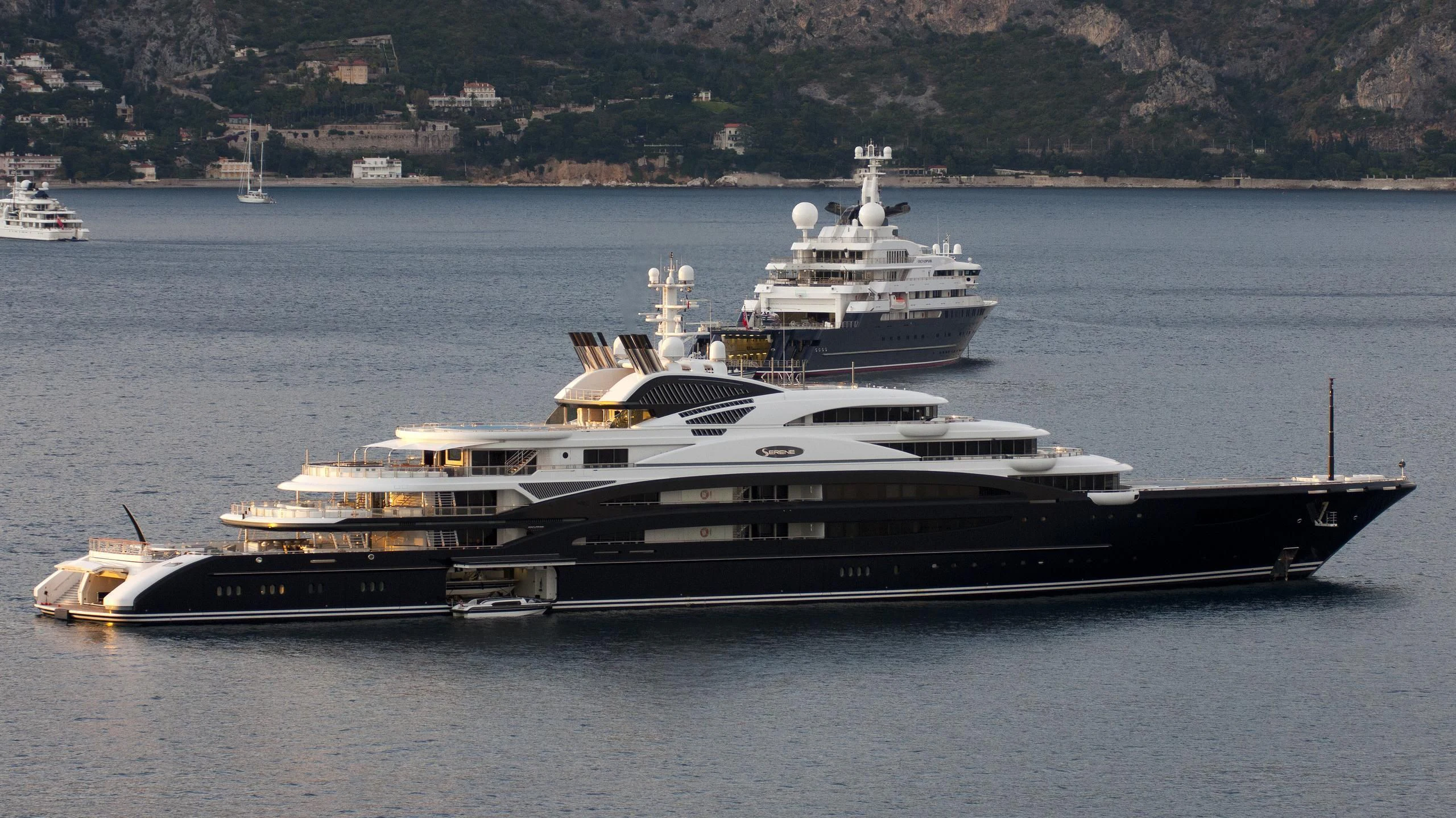 a large ship in the water aboard SERENE Yacht for Sale