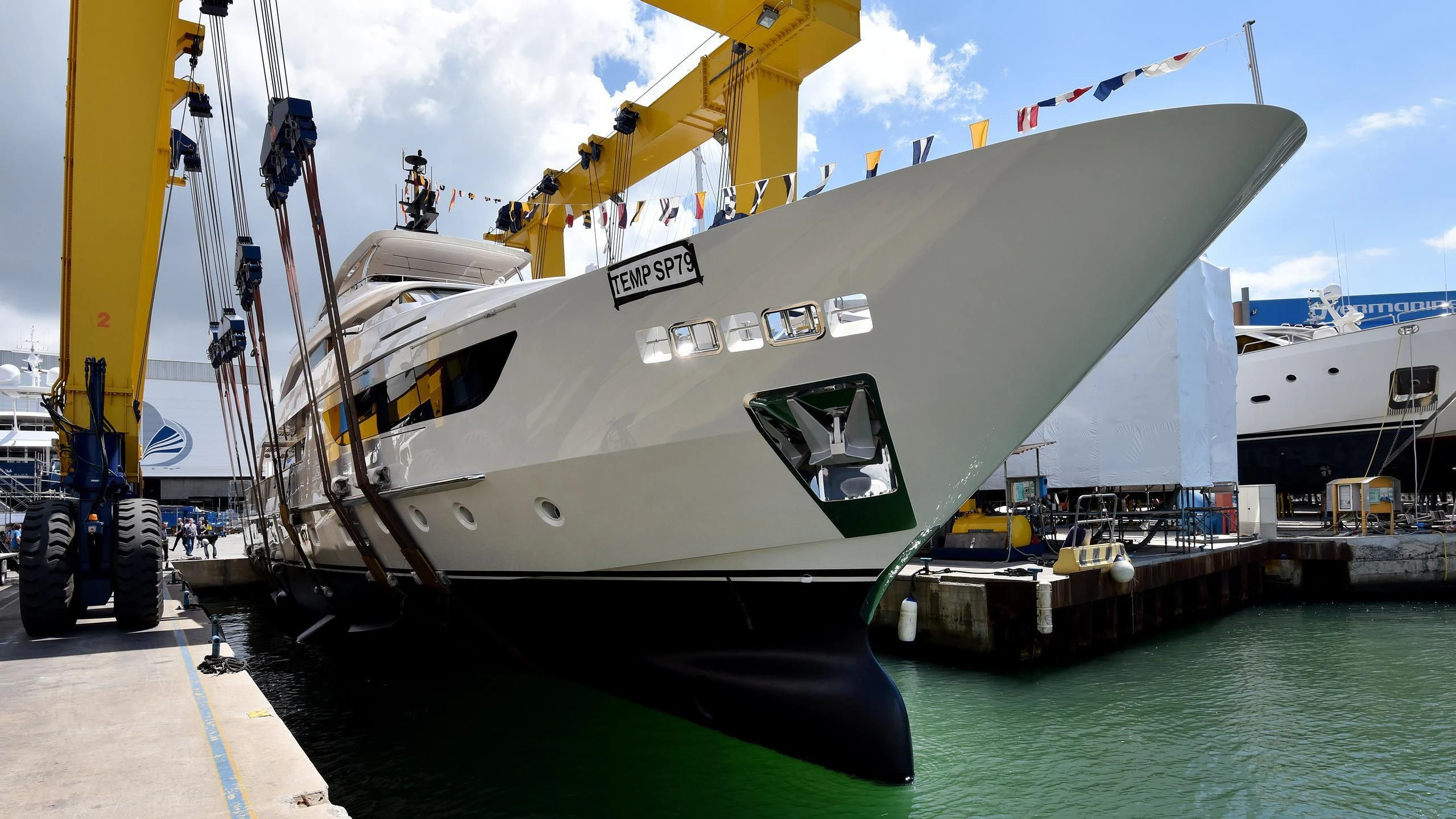 a large white boat aboard SIM SIM I Yacht for Sale