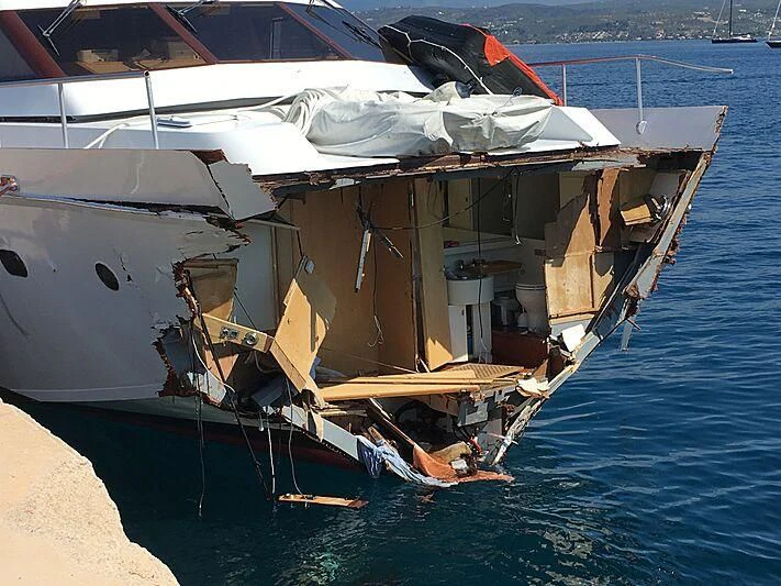 a boat with a lot of junk aboard LONELY SEAGULL Yacht for Sale