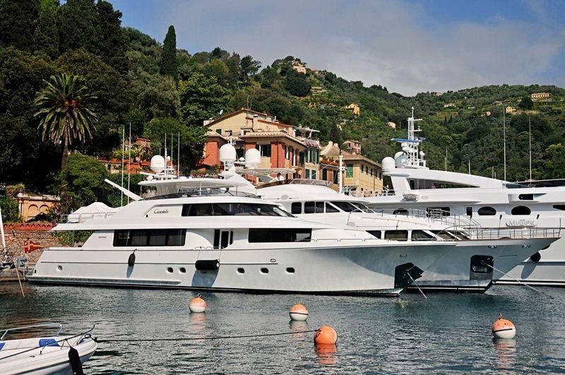 a white yacht in the water aboard BRAVO ZULU Yacht for Sale