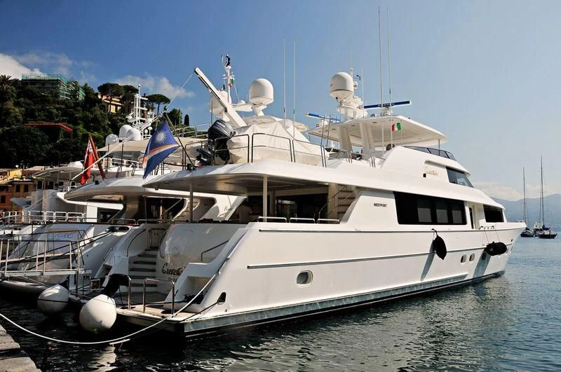 a large white boat in the water aboard BRAVO ZULU Yacht for Sale