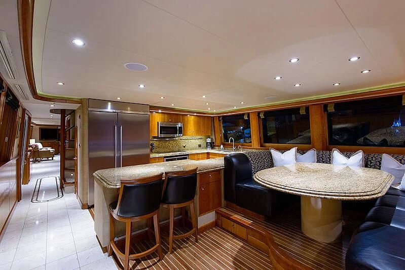 a kitchen and living room aboard BRAVO ZULU Yacht for Sale