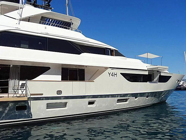 a white yacht on the water aboard Y4H Yacht for Sale