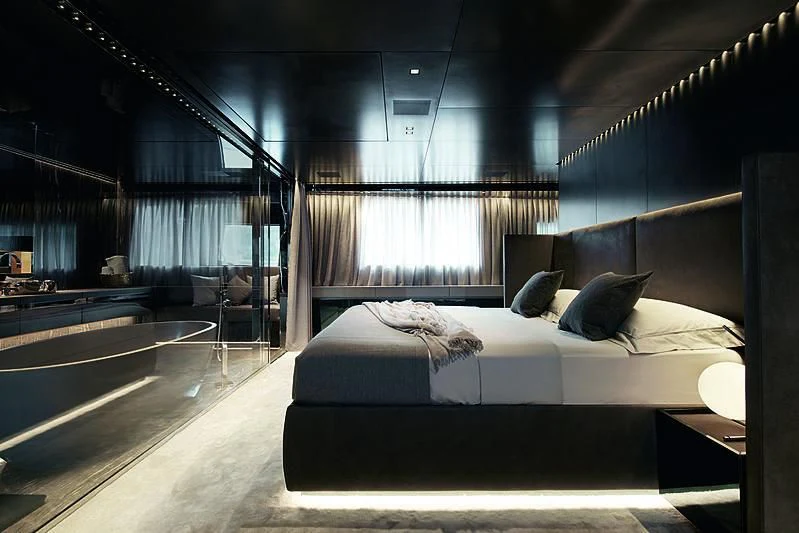 a room with a bed and a window aboard Y4H Yacht for Sale
