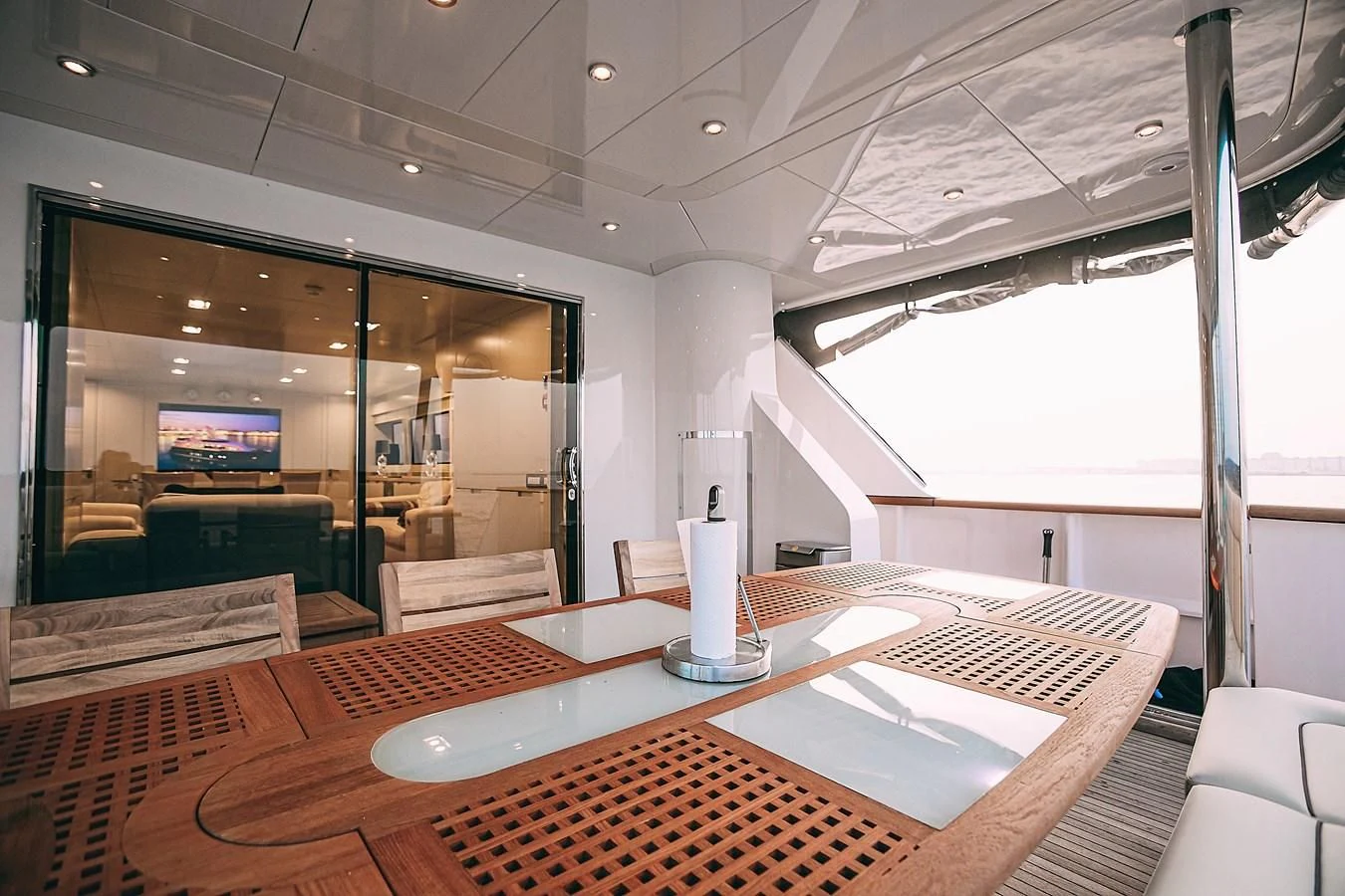 a room with a table and chairs aboard KALISA Yacht for Sale