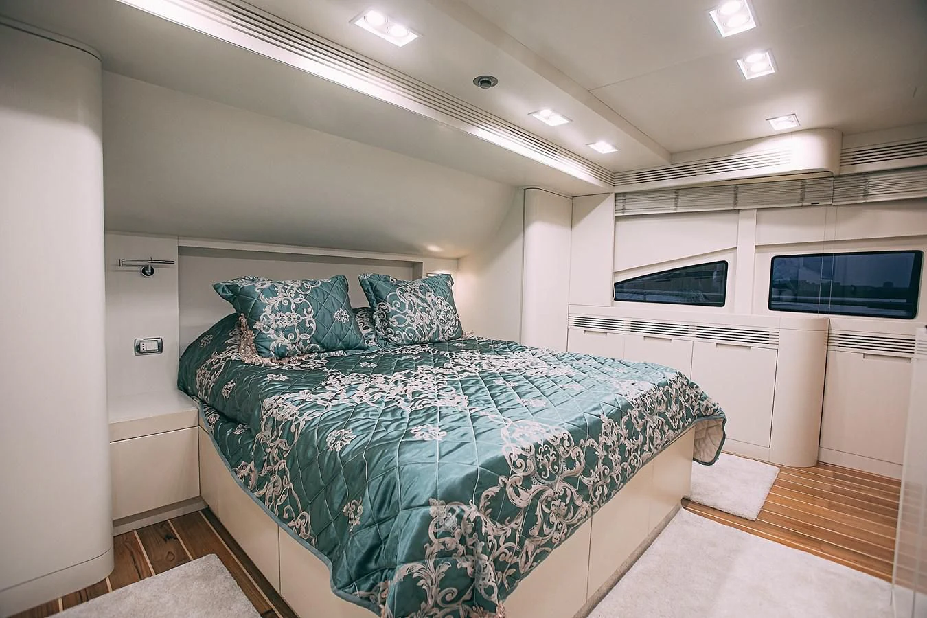 a bed in a room aboard KALISA Yacht for Sale