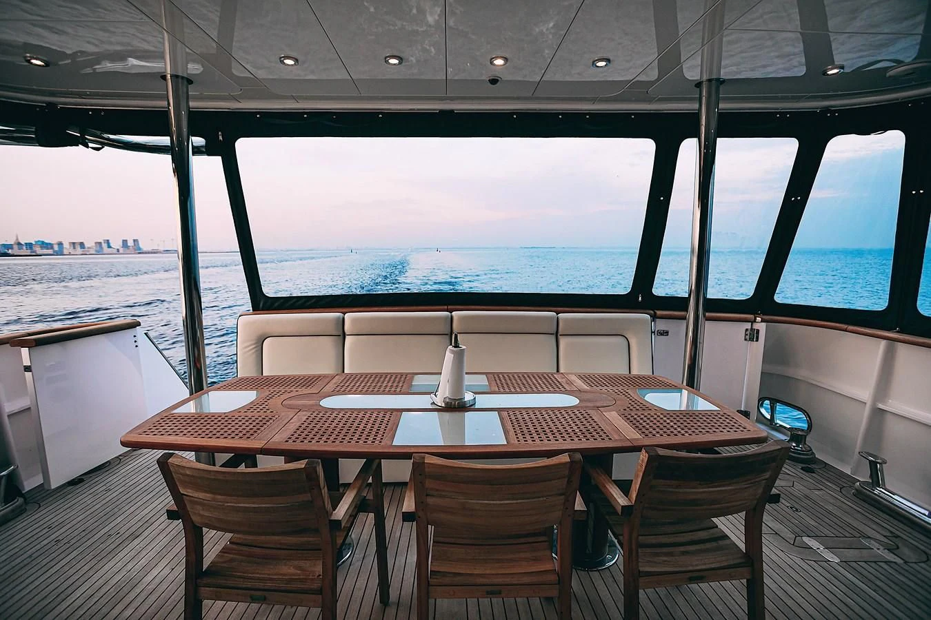 a table on a deck aboard KALISA Yacht for Sale