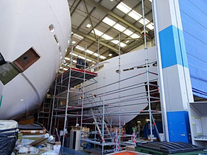 a large machine in a factory aboard NEXUS Yacht for Charter