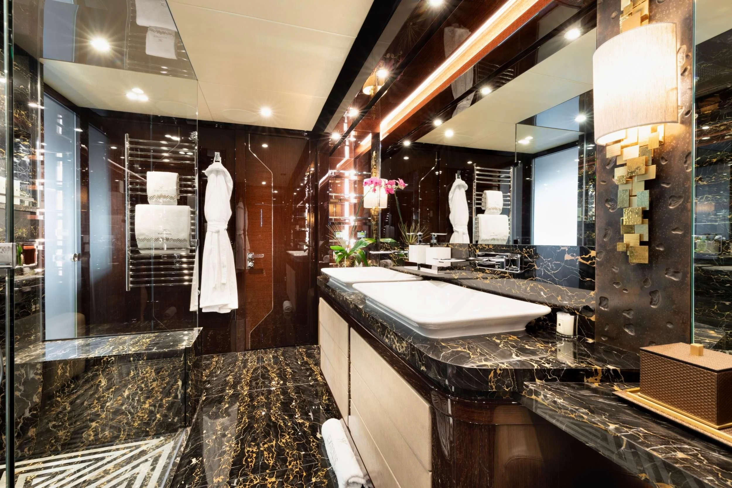 a bathroom with a large marble counter aboard NEXUS Yacht for Charter