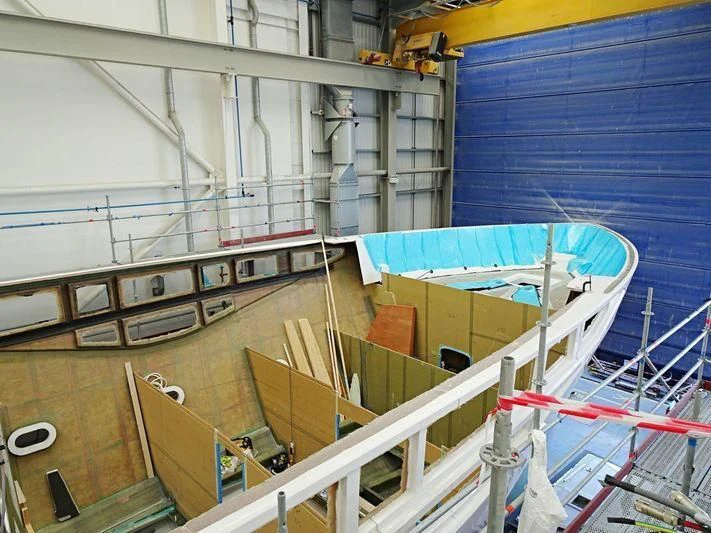 a building with a deck and a pool aboard NEXUS Yacht for Charter