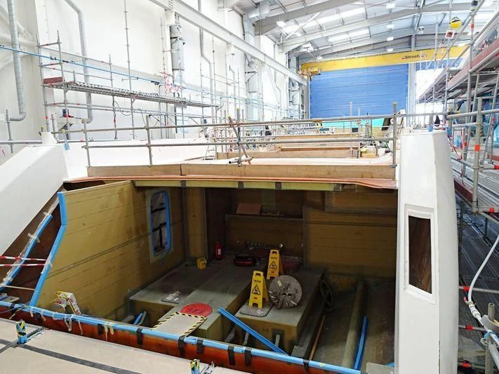 a large room with a large machine aboard NEXUS Yacht for Charter