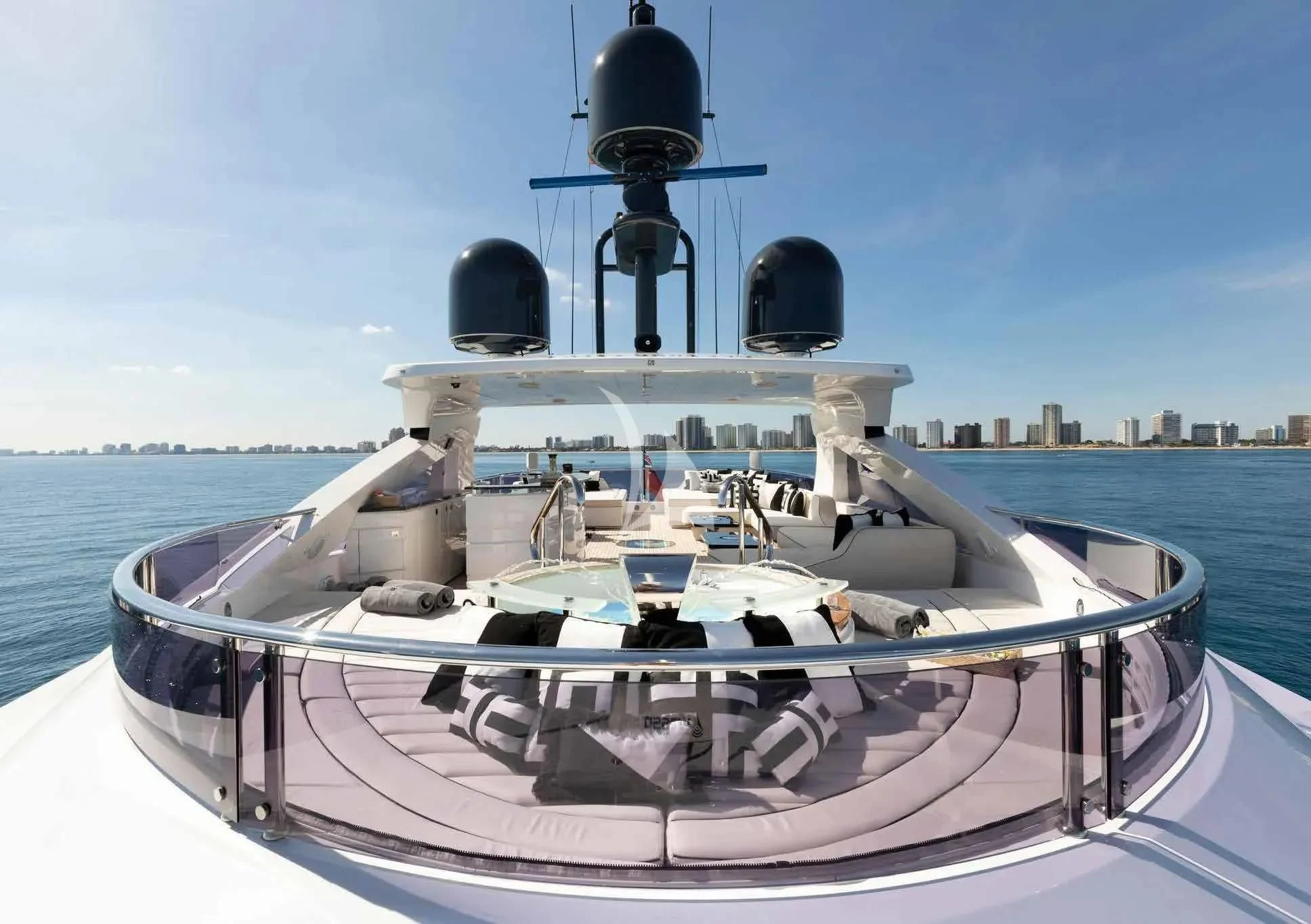 a white boat with black domes aboard NEXUS Yacht for Charter