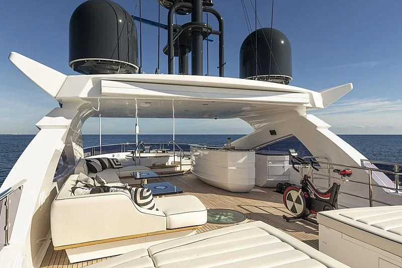 a boat with a satellite dish on the deck aboard NEXUS Yacht for Charter