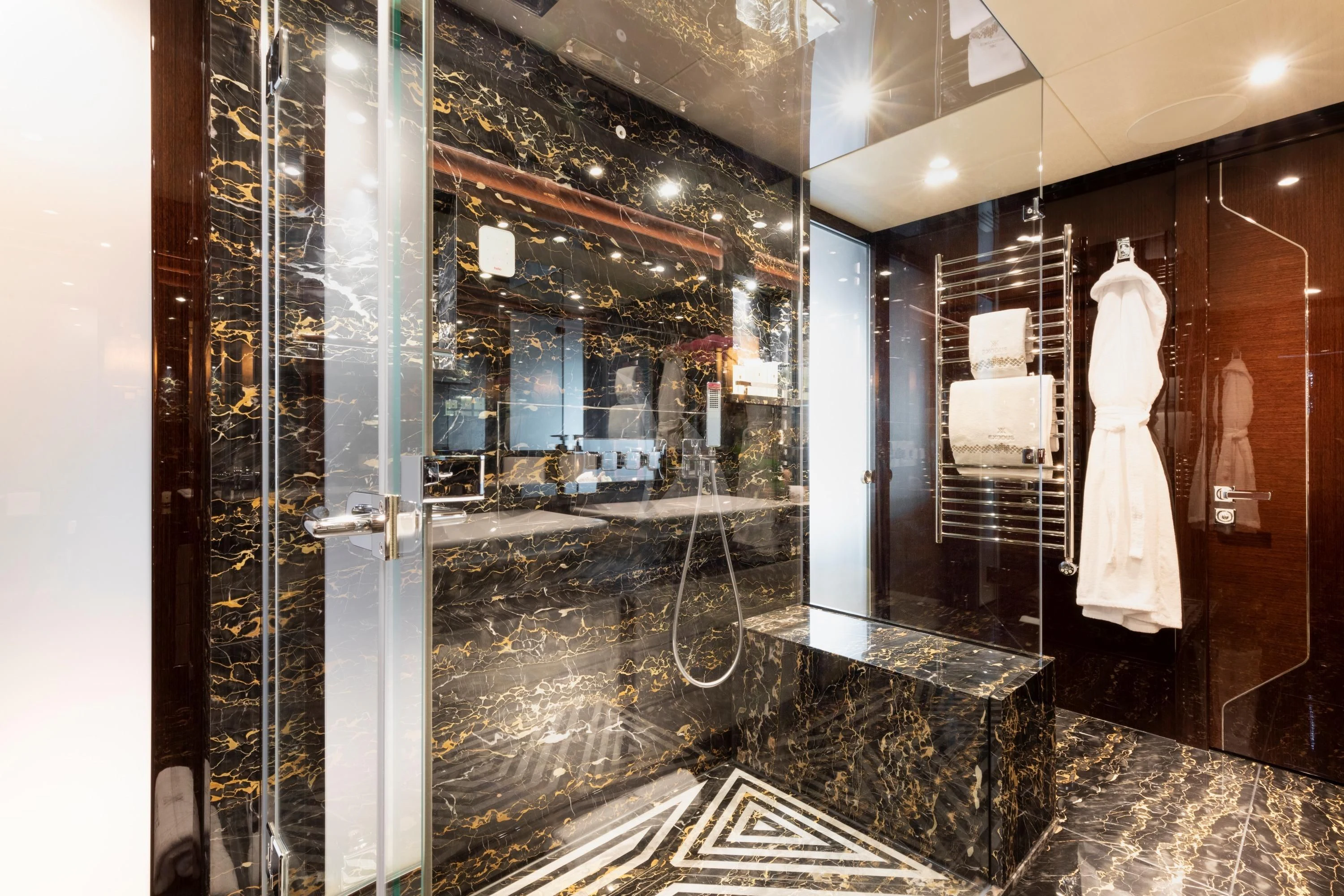 a large display case with a dress from it aboard NEXUS Yacht for Charter