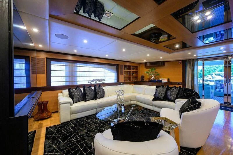 a living room with a large window aboard KIMBERLIE Yacht for Sale