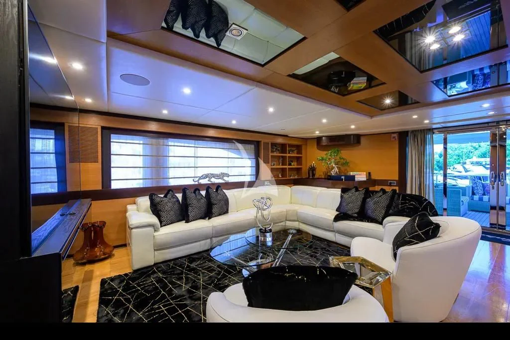 a living room with a large window aboard KIMBERLIE Yacht for Sale